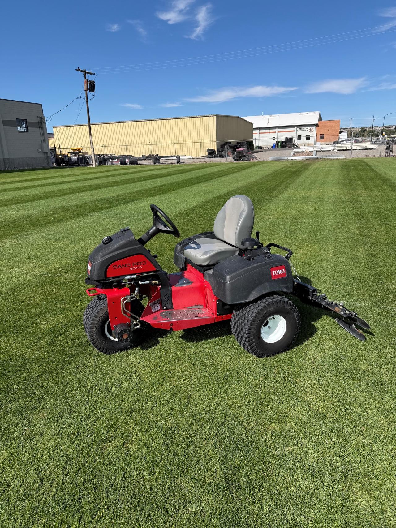Toro Sand Pro® 5040 w/ Rear Tooth Rake Kit & Pivot Trowel Kit — photo 1 of 3