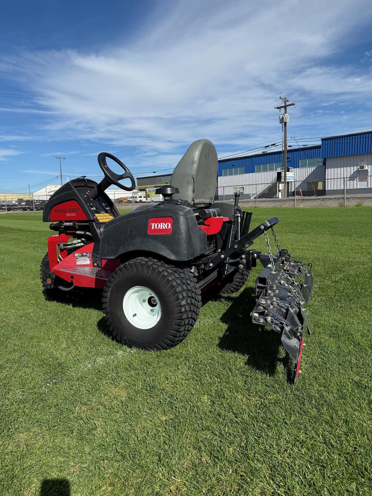 Toro Sand Pro® 5040 w/ Rear Tooth Rake Kit & Pivot Trowel Kit — photo 2 of 3
